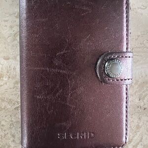 Secrid Dark Burgundy Leather RFID Credit Card Travel Wallet.
